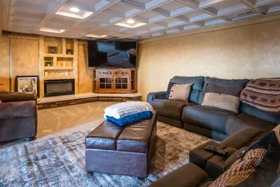 Lower level features a great media room area