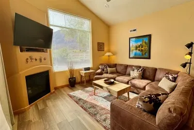 Spacious living area with large leather sectional and huge views!