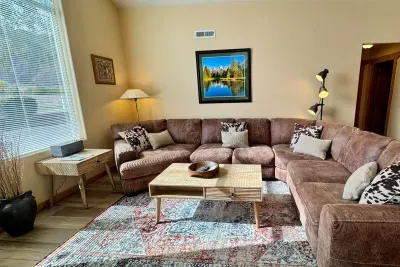 Spacious living area with large leather sectional and huge views!