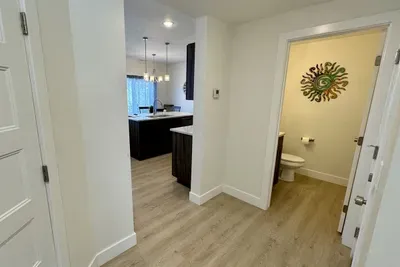 Half bathroom centrally located on the lower level