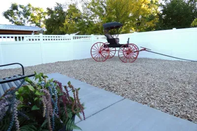 Private outdoor space in the backyard. Old doctors carriage for photo opportunities!