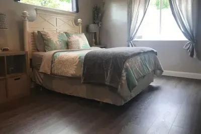 Large bedroom, queen size bed, walk in closet.