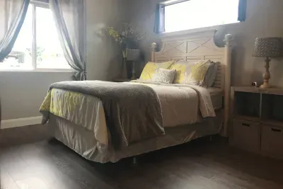 Large bedroom, queen size bed, walk in closet.