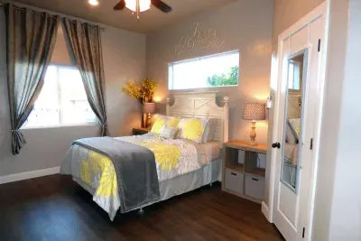 Large bedroom, queen size bed, walk in closet.