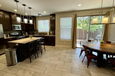 Dining Area with Extra Seating at the Kitchen Island