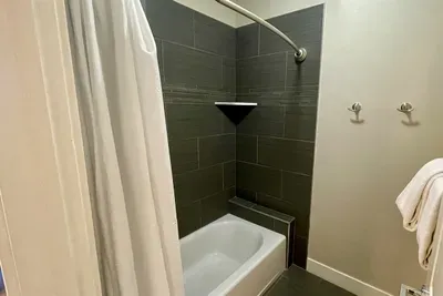 Tub/Shower Combo in Shared Guest Bathroom