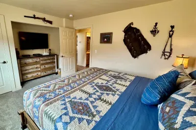 Guest Bedroom #1 with King Bed & TV