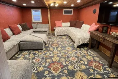 Comfortable Entertaining Space in the Basement with Extra Beds!