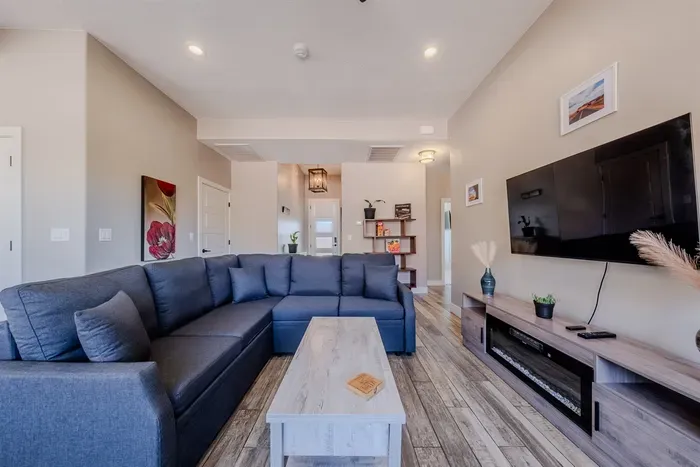 Comfortable Living Room with Smart TV & Fireplace