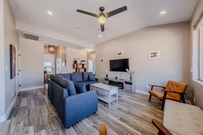 Comfortable Living Room with Smart TV & Fireplace