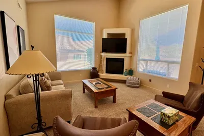 Comfortable Living Room with Smart TV & Fireplace
