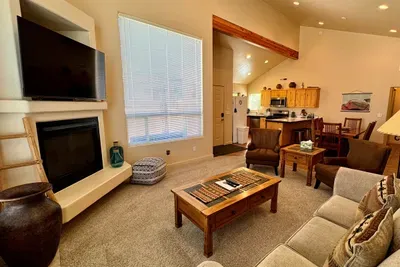 Comfortable Living Room with Smart TV & Fireplace