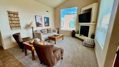 Comfortable Living Room with Smart TV & Fireplace