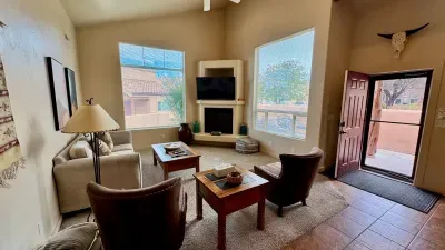Comfortable Living Room with Smart TV & Fireplace