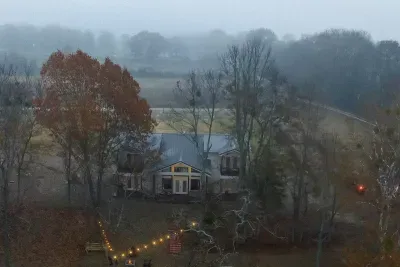 Nestled in Woods by the River