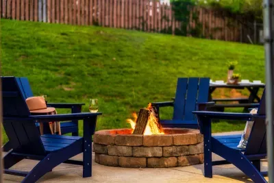 Enjoying Firepit while kids and pet play in the fenced backyard
