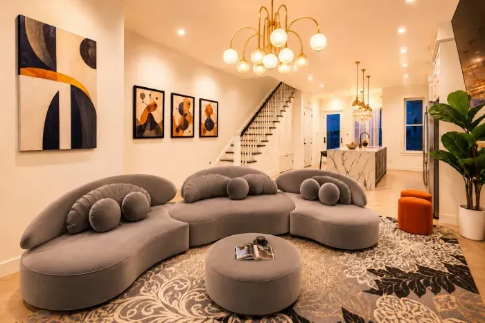Relax with family and friends in the inviting seating area, enjoy conversations around the oversized ottoman, or unwind after a day exploring the city.