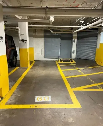 Free garage parking spot in an Apartment Building close to the townhouse.  Walking to the parking garage takes about 3 minutes.  Please note the parking space is about 74’’ wide, so it is most suitable for a compact car