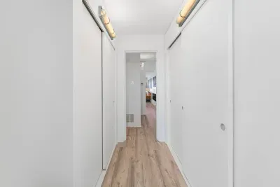 Hallway Closets provide plenty of storage - Leading to the Living Room