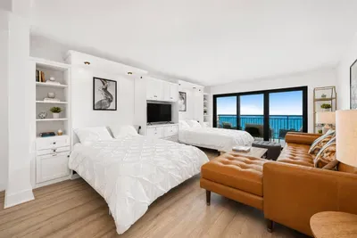 Two queen size Murphy Beds in use