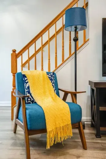 Accent chair in the living room next to the TV