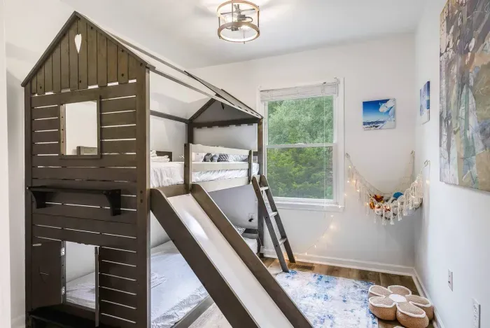 Bedroom #4.  Kids Bedroom on 3rd Floor with twin bunk bed, Arcade game, stuffed animal toys, floor cushions