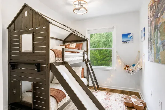 Bedroom #4.  Kids Bedroom on 3rd Floor with twin bunk bed, Arcade game, stuffed animal toys, floor cushions