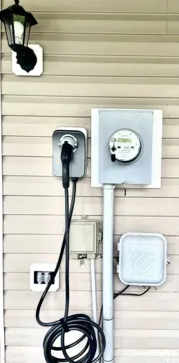 Level 2 EV Charger.  Tesla needs a separate adaptor which is not provided by the host. 