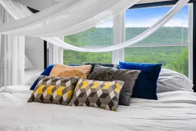 Bedroom #2 (3rd Floor).  King Canopy Bed with mountain view.