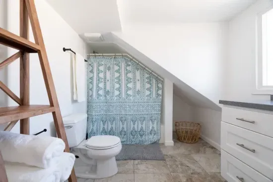 Upstairs and second bathroom with tub.