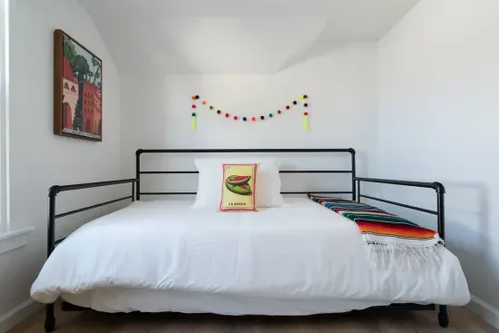 La Sandia is the second room located on the second floor, has a trundle bed with 2 twin beds, and the second bed can be lifted up to make 1 full bed.