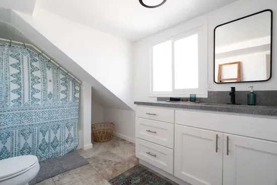 Upstairs and second bathroom with tub.