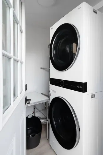 Free washer & dryer located in the backyard in its own room.
