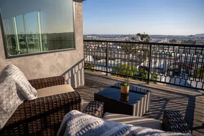 main living area wrap around deck with 180 city panoramic views! 2 sections to sit and enjoy the view!