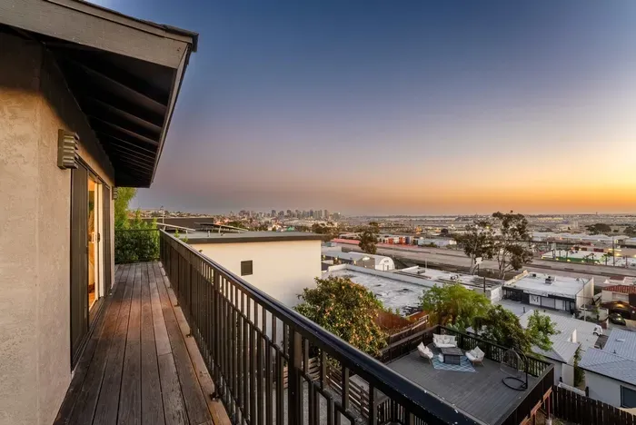 main living area wrap around deck with 180 city panoramic views! 2 sections to sit and enjoy the view!