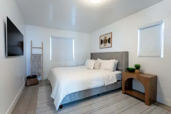 Upstairs bedroom - king bed, TV.