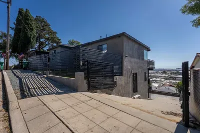 Driveway to get to the parking, to the hot tub, Fire pit, Gym, and Laundry room.