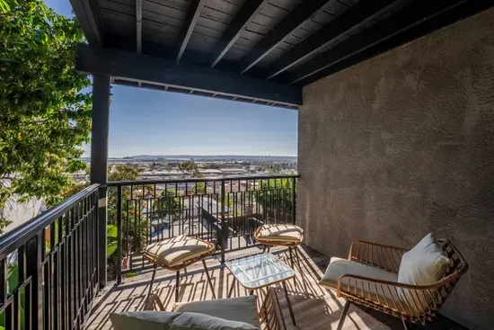 Downstairs bedroom private balcony with city views