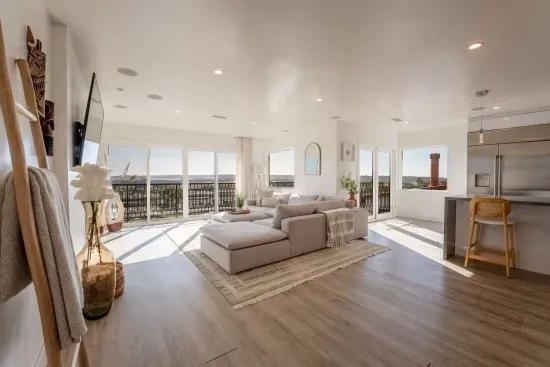 Living areas, sectional couch, smart tv, 180 panoramic views of San Diego.
