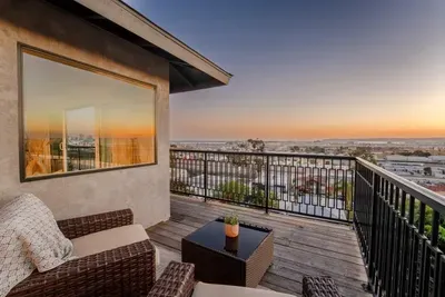 main living area wrap around deck with 180 city panoramic views! 2 sections to sit and enjoy the view!