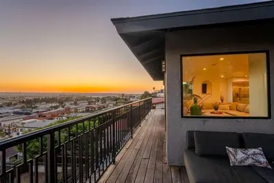 main living area wrap around deck with 180 city panoramic views! 2 sections to sit and enjoy the view!