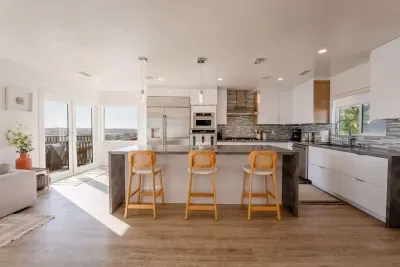 Full kitchen and fully stocked with all of the essentials.