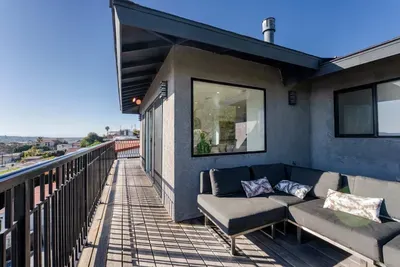 main living area wrap around deck with 180 city panoramic views! 2 sections to sit and enjoy the view!