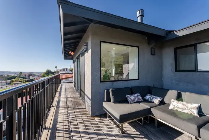 main living area wrap around deck with 180 city panoramic views! 2 sections to sit and enjoy the view!