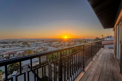 main living area wrap around deck with 180 city panoramic views! 2 sections to sit and enjoy the view!
