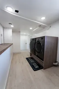 Laundry room. Access from the exterior next to the gym or you can access through the gym.