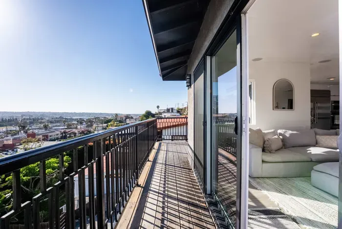 main living area wrap around deck with 180 city panoramic views! 2 sections to sit and enjoy the view!
