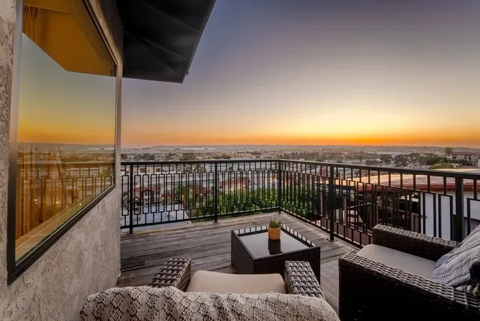 main living area wrap around deck with 180 city panoramic views! 2 sections to sit and enjoy the view!