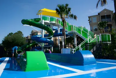 Windsor Hills Water Park: Twisting green and blue water slides at the community water park, included with your stay!