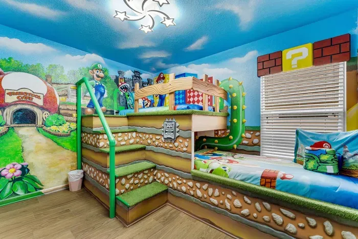 Mario-Themed Room: Climb the green pipe stairs past Question Mark blocks into this Super Mario-inspired bunk retreat with a Luigi mural!
